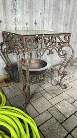 Vintage wrought iron table with planter