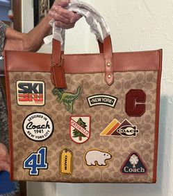 Coach Field Tote in Signature Canvas with Patches.