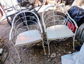 Heavy wrought iron patio chairs