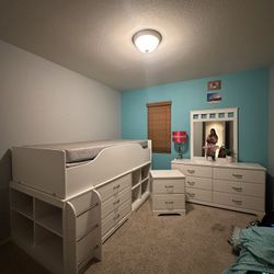White Loft Bedroom set including vanity, nightstand, and storage