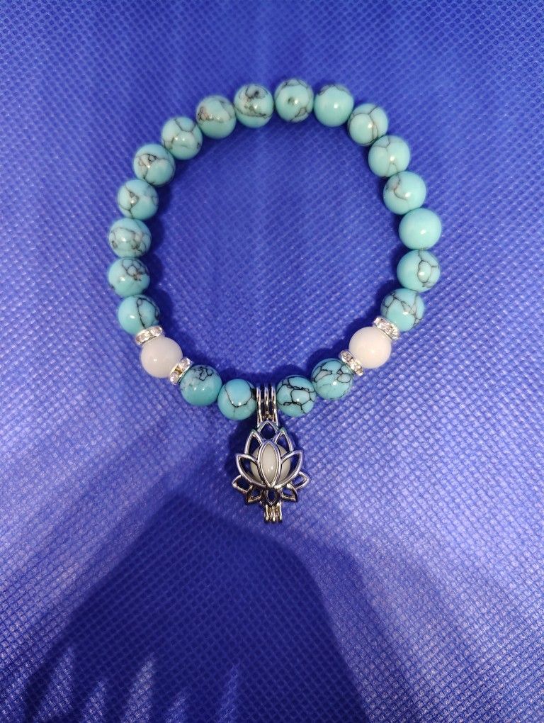 Glow In The Dark Turquoise Bracelet With Lotus Charm