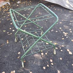 Original vintage green record player and vinyl holder