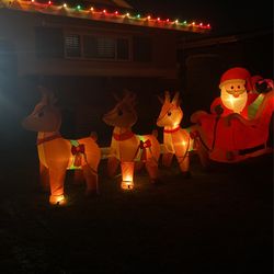 Santa and reindeer blowup