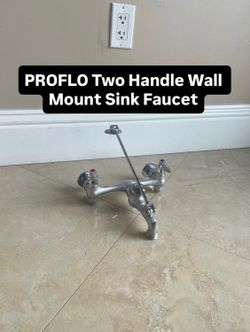 PROFLO Two Handle Wall Mount Sink Faucet (1 Available)