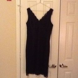 MAGGIE LONDON black lace dress. Size 12. Banded waist. Back zipper. Worn once, excellent condition.