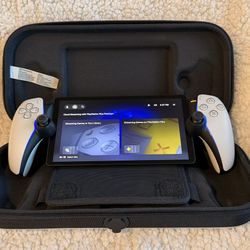 Two PS5 Portals( White And Black) $200 Each Come With Carrying Cases