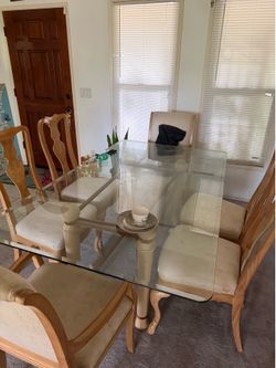 Glass tabletop + 6 chairs and hutch