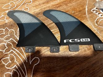 Surfboard fins