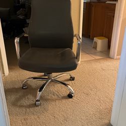 Grey leather office computer chair 