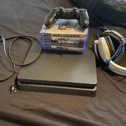 1TB Ps4 Slim With 6 Games And DualShock Controller With Headset