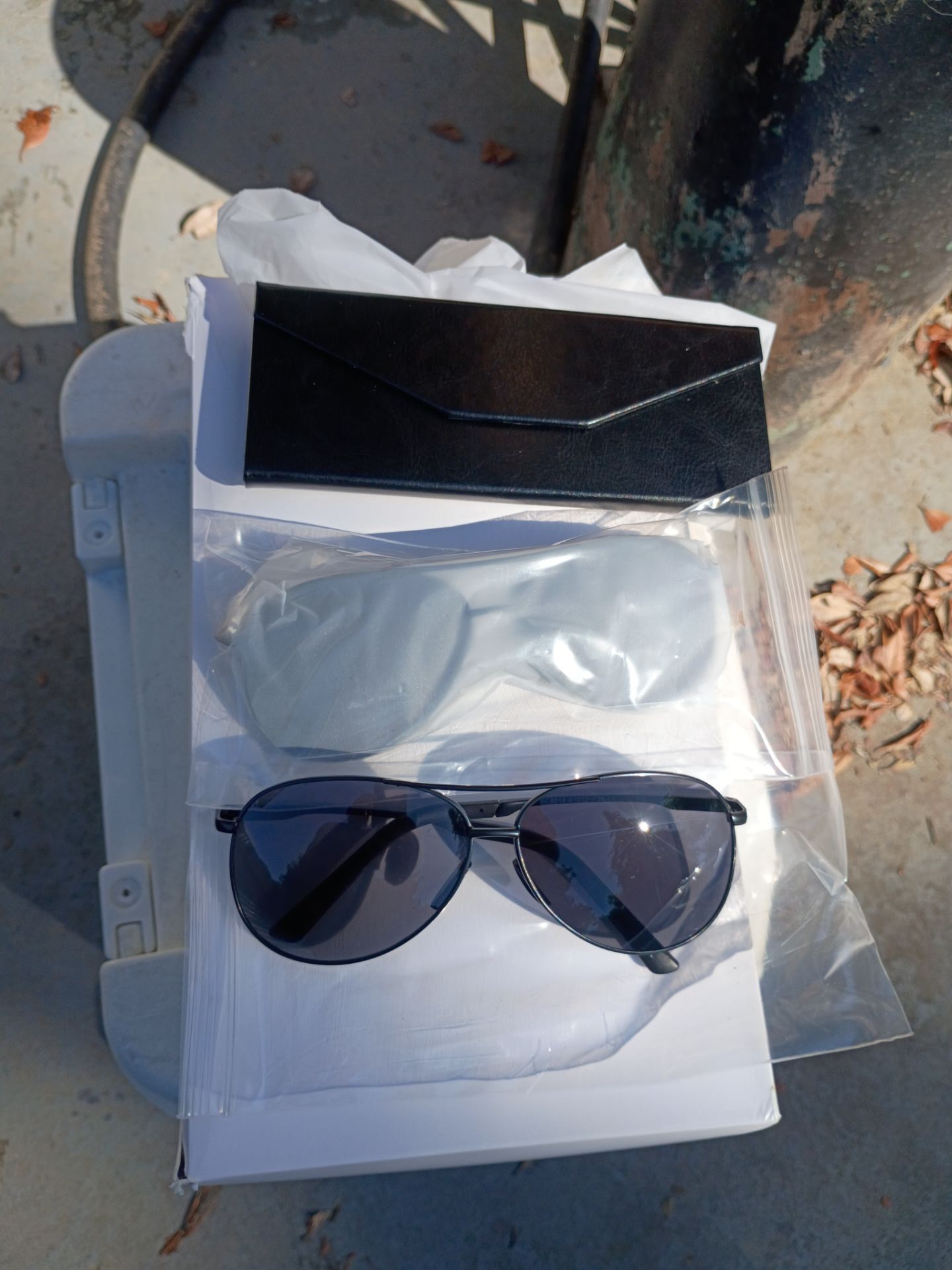 (Brand new)..."Sunglasses"...with cases...