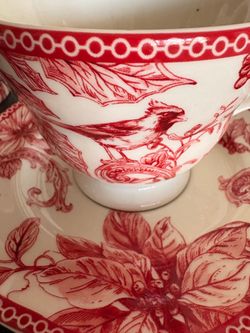 Tea pot with matching tea cup and saicer