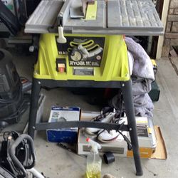 RYOBI 10 inch table saw works perfect excellent condition with the table