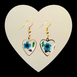 Homemade Heart-Shaped Earrings With Small Blue Flowers