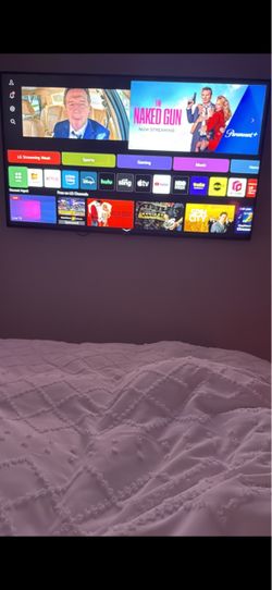 LG 65” NanoCell 4K UHD Smart TV + Full-Motion Wall Mount
