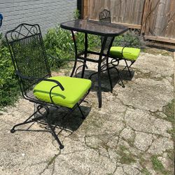 Table And Two Chairs that rock good condition