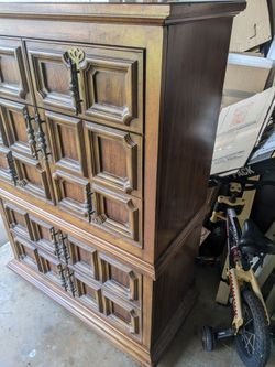 Wood dresser great condition 38x18 and 53" is the height drawers.are good