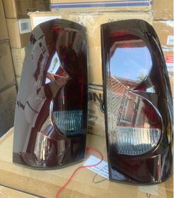 99-06 Chevy Silverado Smoke Red Tail Lights