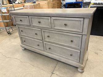 ASHLEY FURNITURE Grey Farmhouse Style 7 Drawer Lowboy Dresser with Bun Feet and Hidden Pull Out Tray