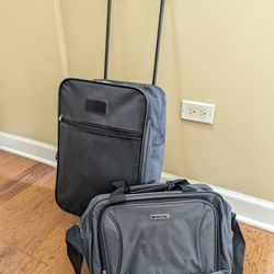 Suitcase Carry-on Two Of Them The Smaller One Is New Never Used Color Black Has Wheels And A Handle Great Condition Best Offer