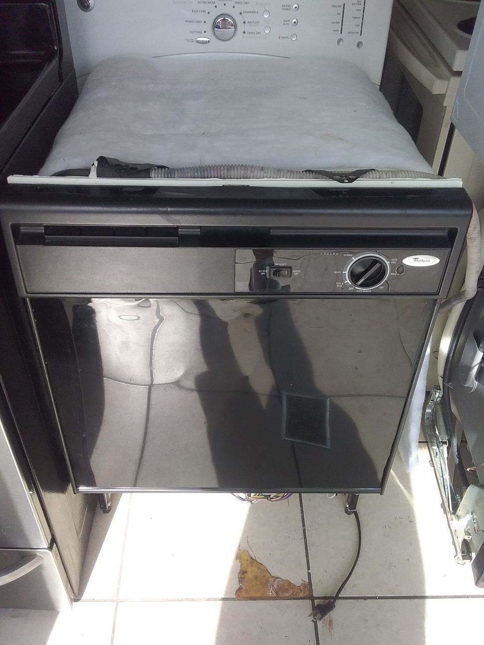 Black whirlpool dishwasher with plastic tub in good working condition