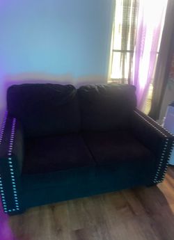 All black silver studed 2 peice sofa set pillows not included....