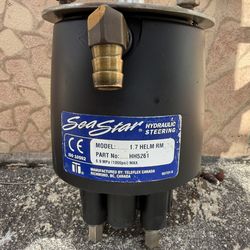 SeaStar HH5261 hydraulic boat steering helm unit and stainless steel steering wheel.
