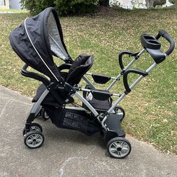 Graco stroller with car seat clamps. 2 seater.
