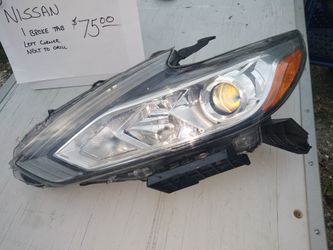 Nissan headlight only one half broke tab
