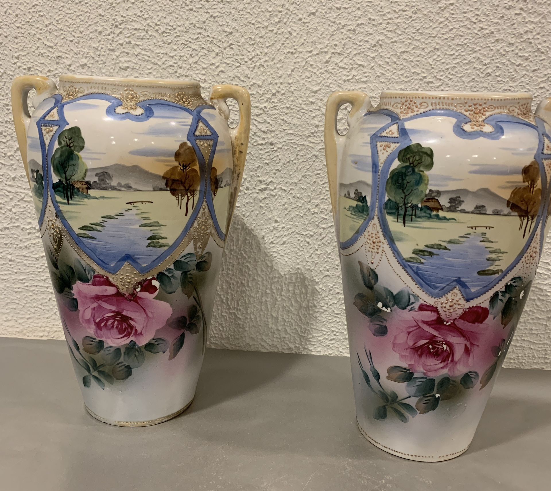 A pair of beautiful antique Royal Nishiki Nippon handled , hand painted 12 “ tall vase roses scenic This is vintage , hand painted Raise marriage If