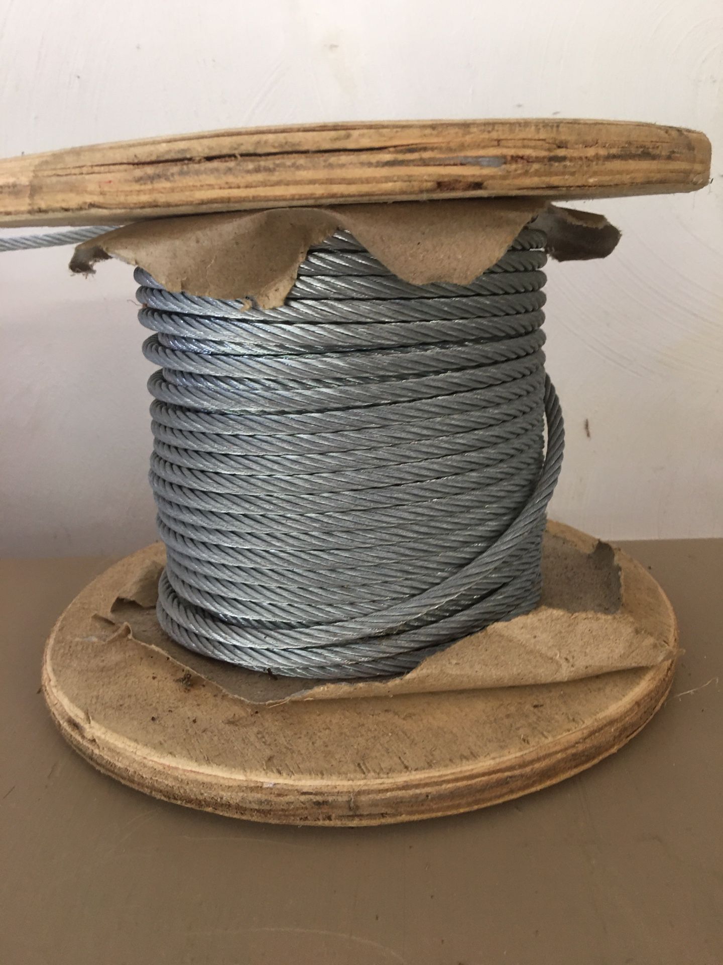 1/4” galvanized steel cable.