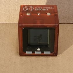 This item is a Radica Cube World electronic collectible toy, specifically the "Sparky" character from Series 3. 
