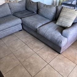 Grey sectional Cindy Crawford Palm Springs Couch