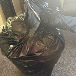 Free Free Bag Of Clothes & TV Stand 