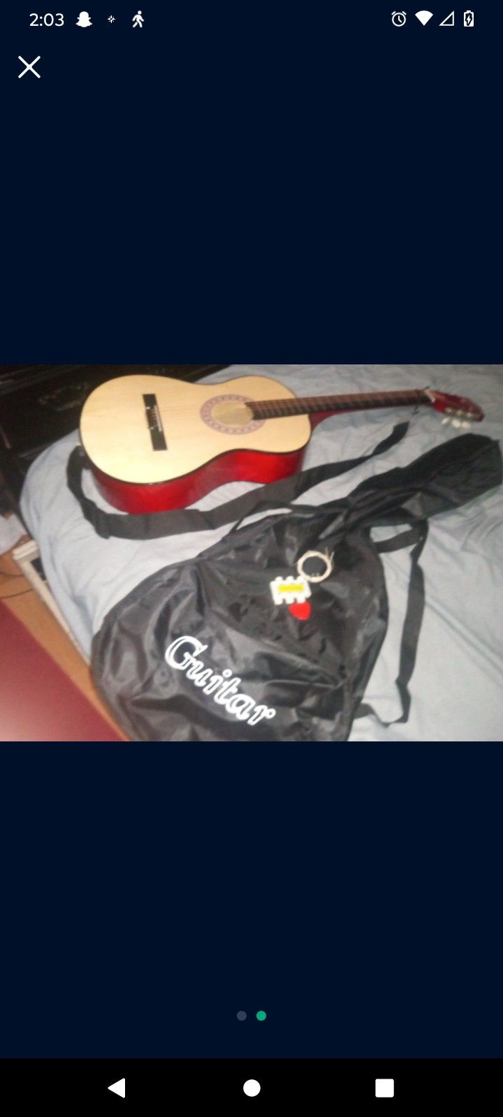 Acoustic Guitar And Bag 