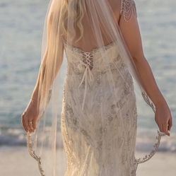Vintage hand stitched, with jewels, long wedding veil. Designer Enaura 