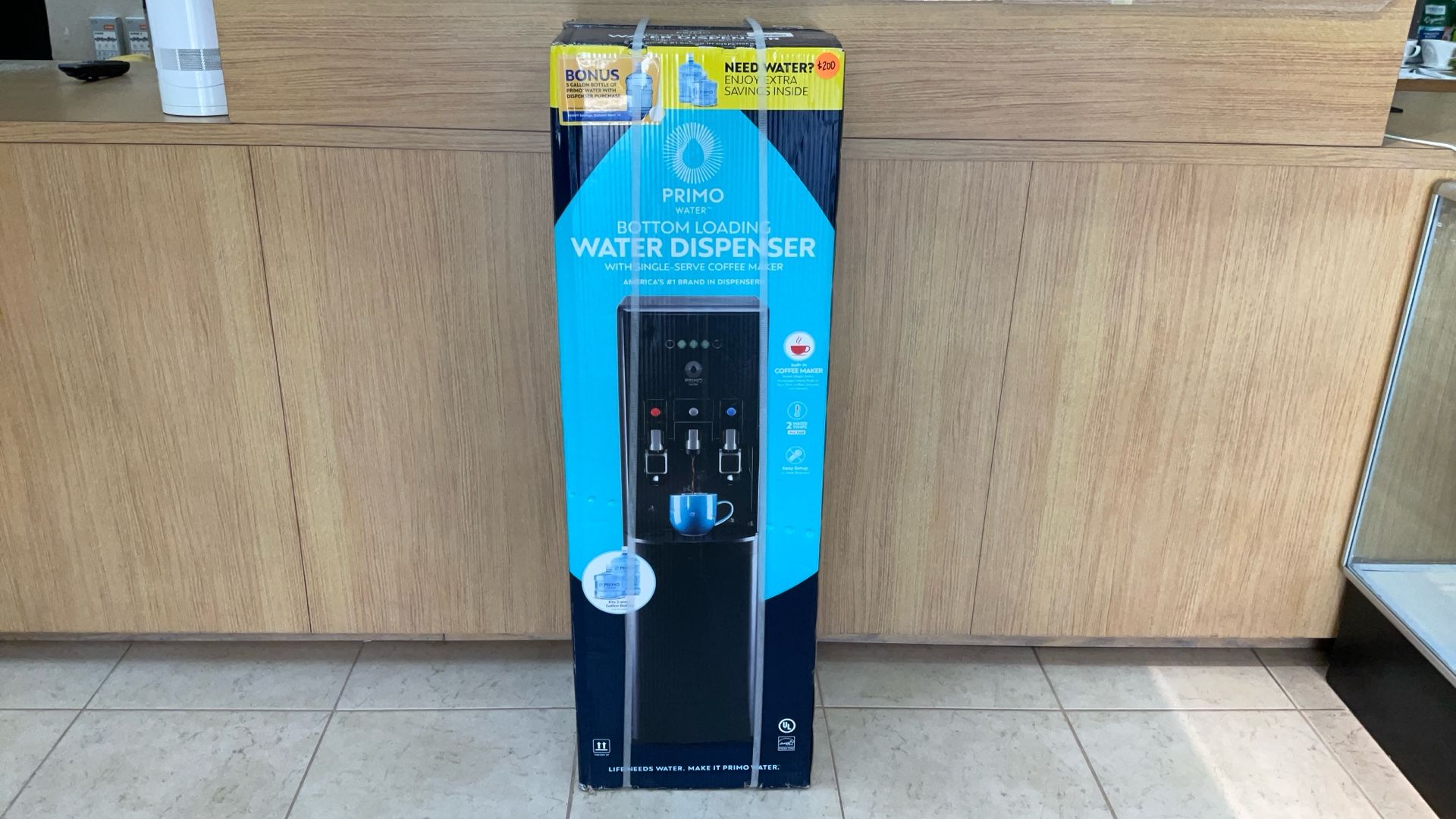 PRIMO WATER BOTTOM LOADING WATER DISPENSER WITH SINGLE-SERVE COFFEE MAKER.