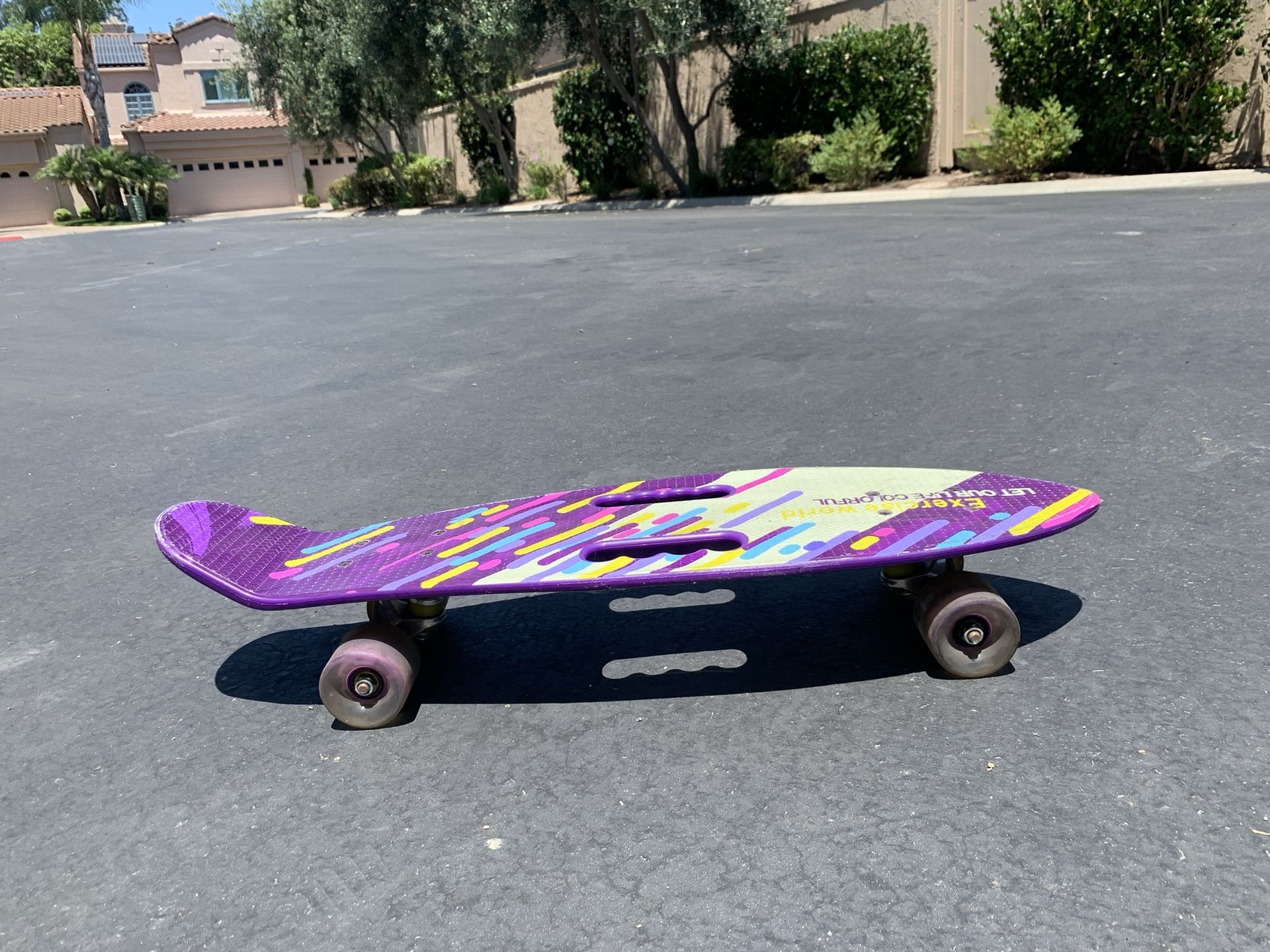Girls Skateboard And Two Scooters