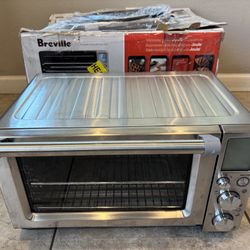 Breville - Oven Air Fryer Pro - Brushed Stainless Steel BOV950BST1BUS1   Used, door closes shut but is a bit loose when opening, tested and works.  Th