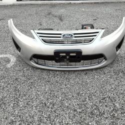 2011-2013 Ford Fiesta Complete Front Bumper With All The Accessories OEM.