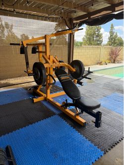 Powertec yellow weight bench with weights and stand