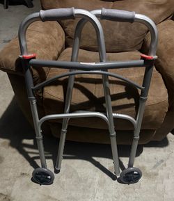 Adjustable height folding adult walker