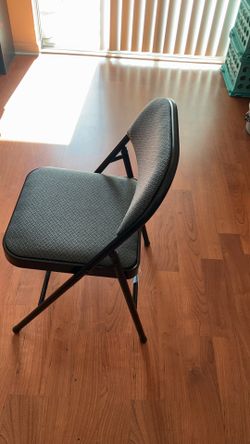Moving sale Folding black chair cushioned seat and back