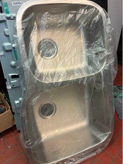 Under counter steel sink