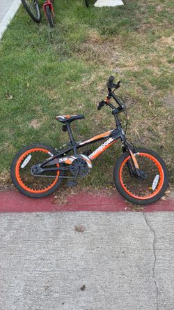 Black and orange mongoose bike for kids