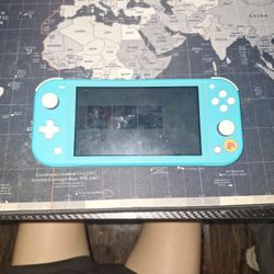 Nintendo Switch Lite in the turquoise color. 