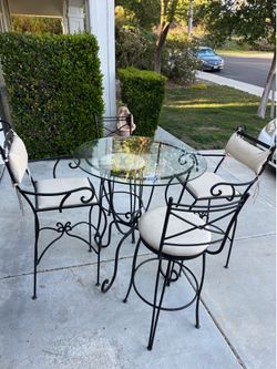 Iron table with four chairs