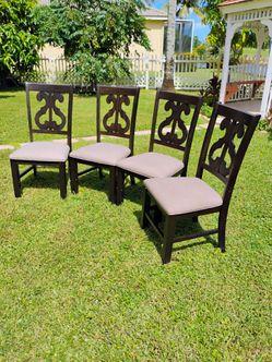 4 Dining room chairs. Walnut hardwood frame. Comfy upholstered fabric seats.
