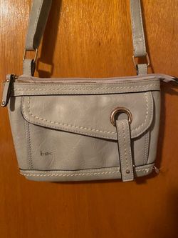 B. O.  C. Light gray purse