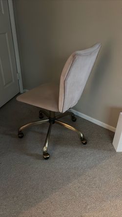 Blush pink desk, chair with brass bottom and wheels
